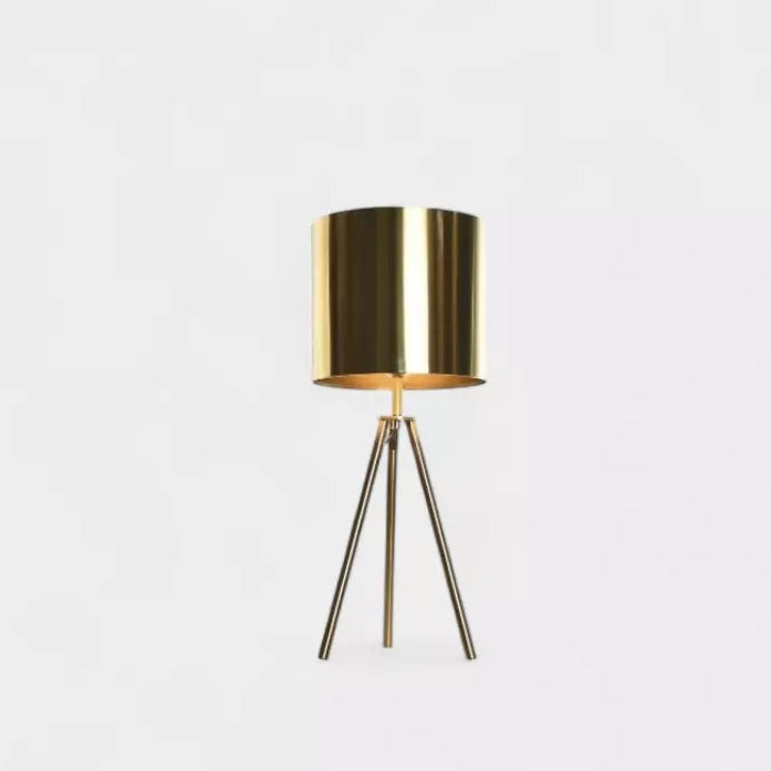Lampe dorée sur trépied OLONNE