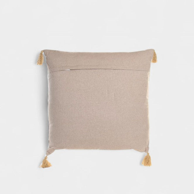 Coussin décoratif à motifs ethniques avec pompons