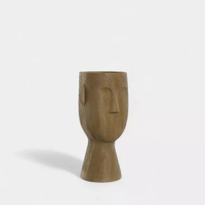 Vase sculpture visage
