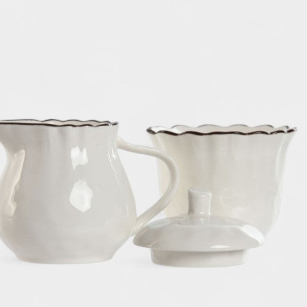 Laitière et sucrier en porcelaine blanche aux bords ondulés CELESTE